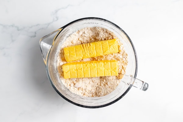 butter in flours, oats, and sugar