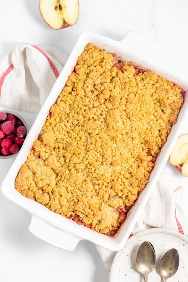 fresh apple cranberry crisp in a baking dish