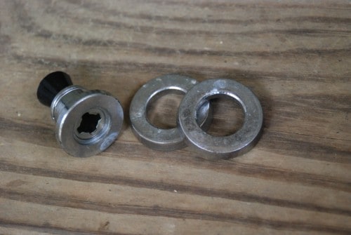 Photo shows a close up of the weights for the pressure cooker