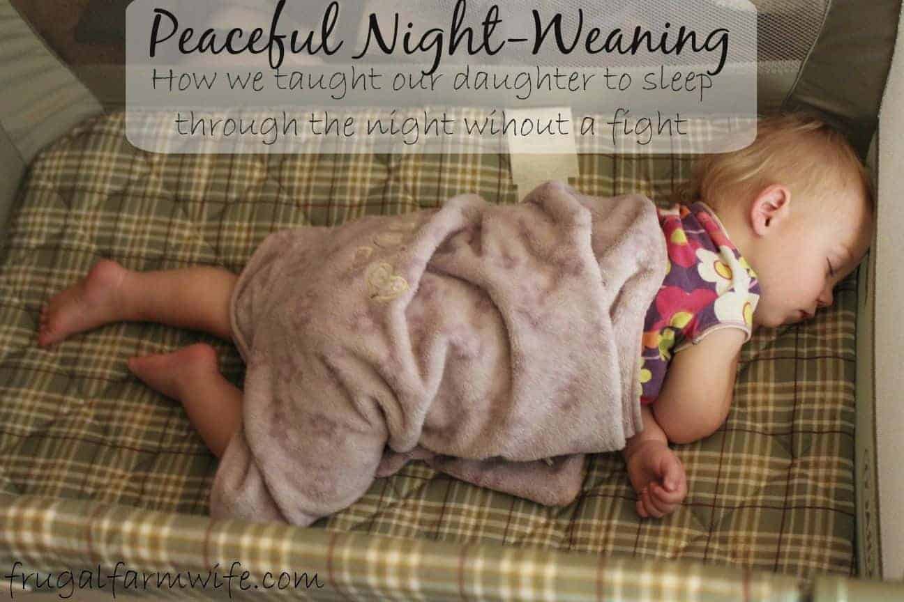 Image shows a young toddler asleep in a pack and play, with a light purple blanket laid over her. Text overlay reads "Peaceful Night-Weaning: How we taught our daughter to sleep through the night without a fight"