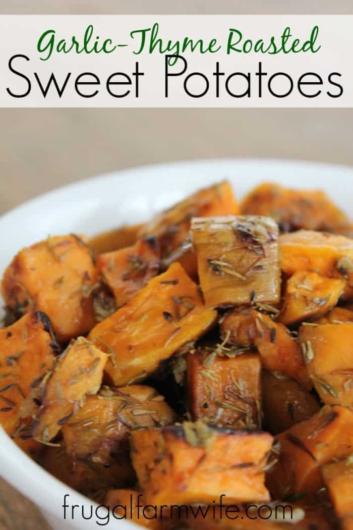 Images shows a large bowl of cut up sweet potatoes with copy that reads "Garlic-Thyme Roasted Sweet Potatoes"