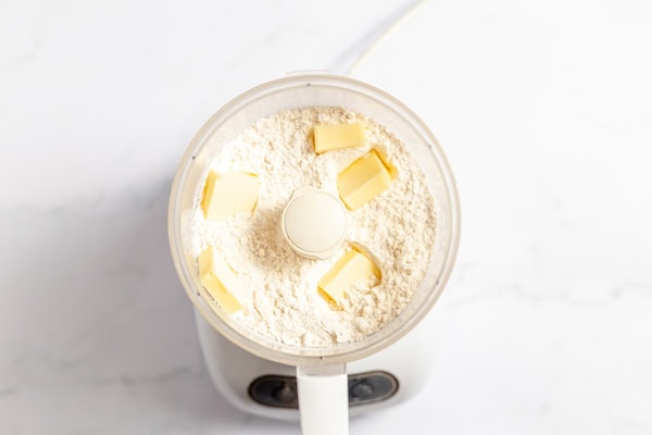 chunks of butter and flour in a food processor