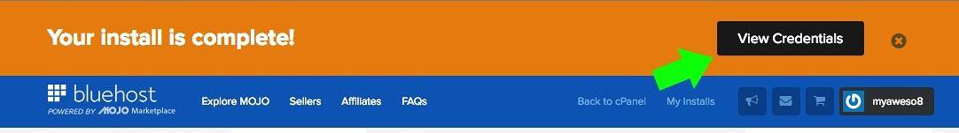 Image shows the Bluehost page after the installation of WordPress is complete. The box "View Credentials" has a green arrow pointing to it. 