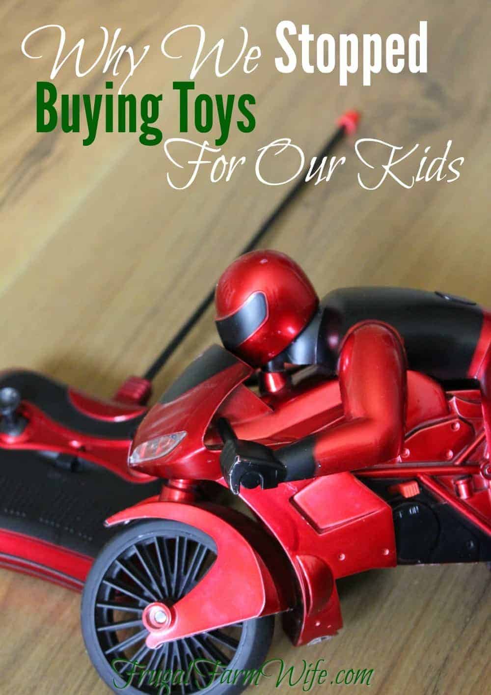 Image shows a small toy on a table, with text that reads "Why We Stopped Buying Toys for Our Kids"