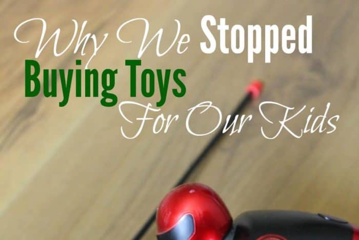 Image shows a small action figure laying on the floor with text that reasd "Why We Stopped Buying Toys for Our Kids"