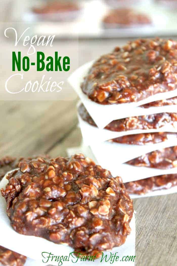 Image shows a stack of vegan, no-bake cookies, stacked on top of each other, separated by parchment paper. Text overlay reads "Vegan No-Bake Cookies"