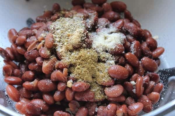 Photo shows a bowl of black beans covered in spices