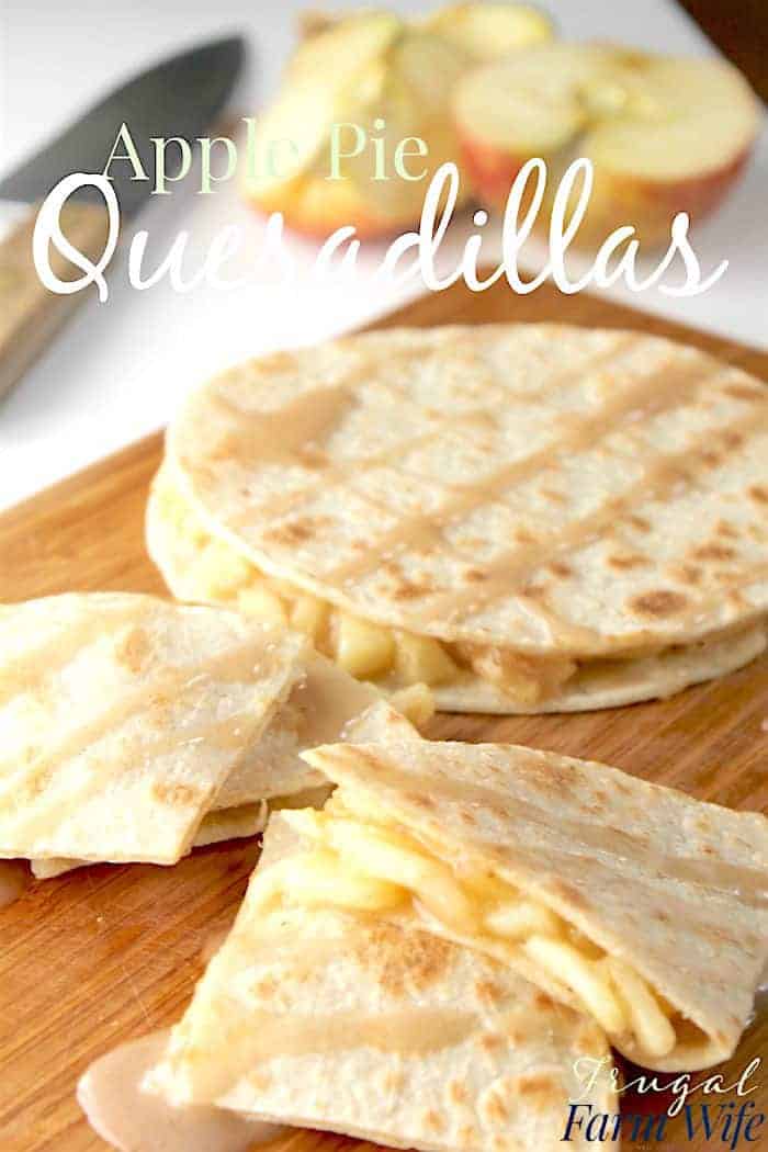 Image shows several apple pie quesadillas on a cutting board with the copy "apple pie quesadillas"