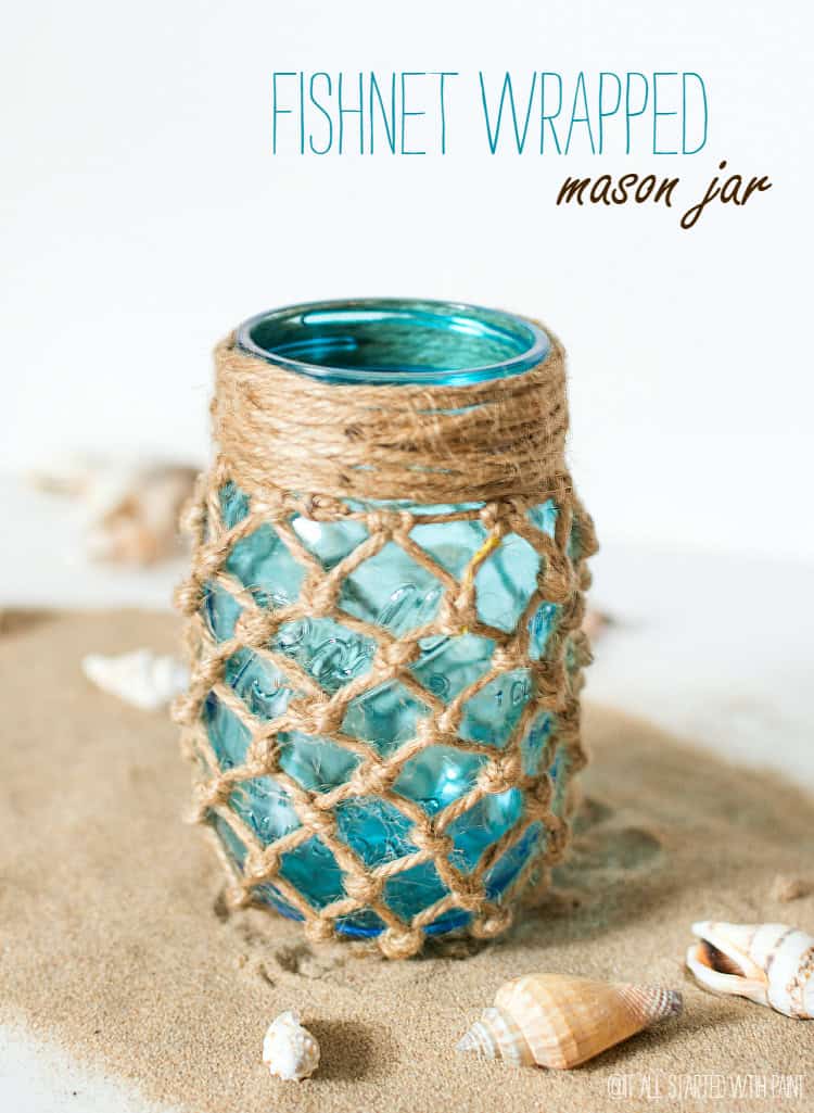 Image shows a blue mason jar wrapped in fishnet. Text above reads "Fishnet Wrapped Mason Jar"