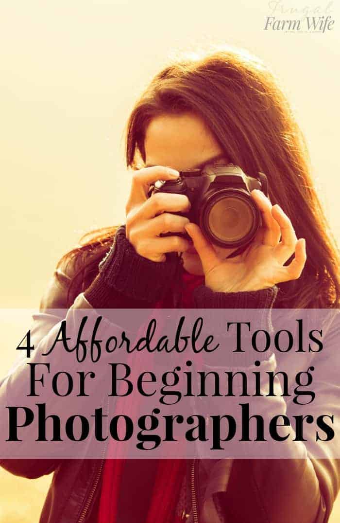 Image shows a woman holding a camera to her face and taking a photo. Text reads "4 Affordable Tools for Beginning Photographers"