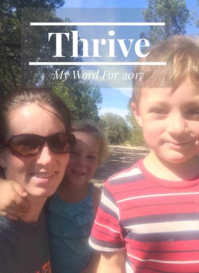 Image shows a woman with two small children outside in the sun. Text overlay reads "Thrive My Word for 2017"