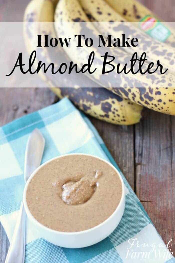Image shows a bunch of bananas next to a bowl of almond butter with text that reads "How to Make Almond Butter"