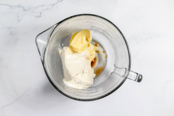 ingredients for cream cheese icing a bowl