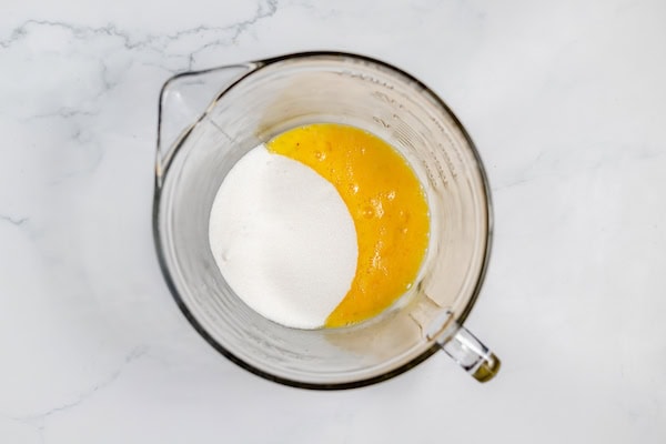sugar and eggs together in a mixing bowl