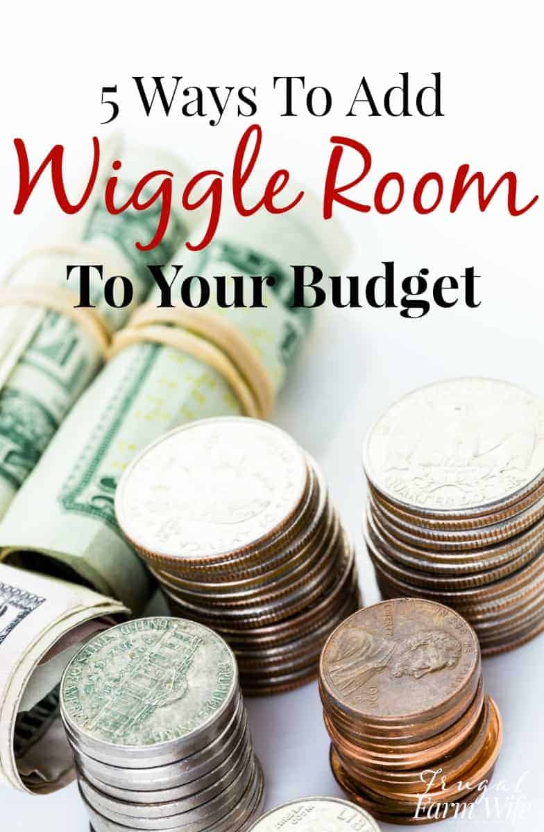 Image shows stacks of coins, and rolled up bills on a table, with text overlay that reads "5 Ways to Add Wiggle Room to Your Budget"
