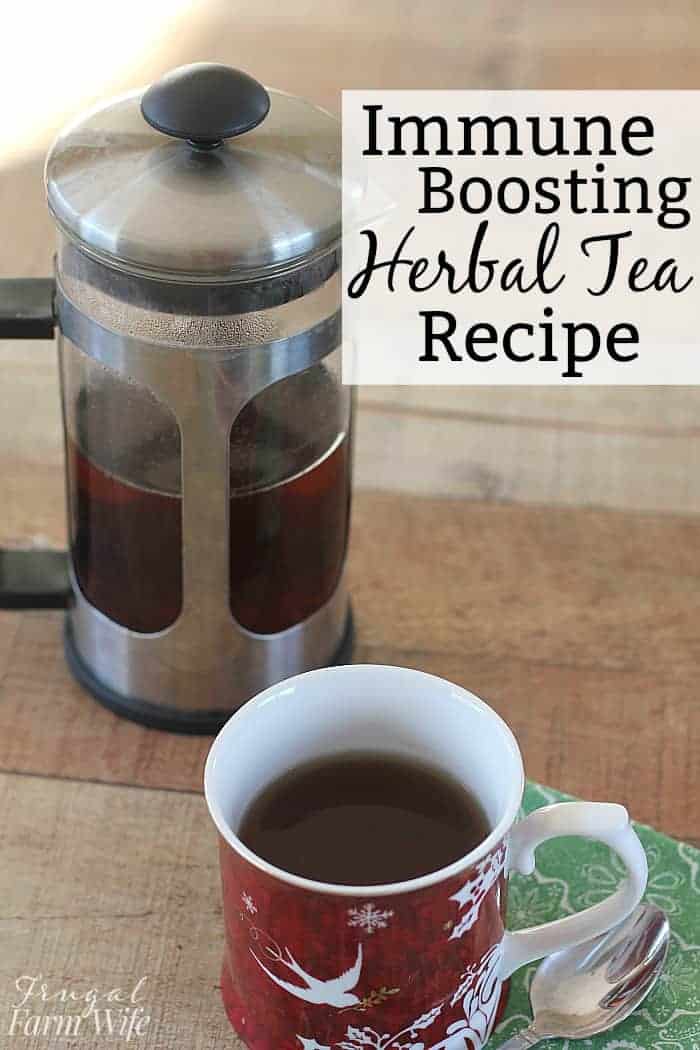 Photo shows a pot of tea on a table with a cup of tea next to it with text overlay that reads "Immune Boosting Herbal Tea Recipe"