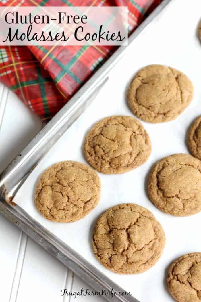 Image shows a cookie sheet of molasses cookies with text that reads "gluten-free molasses cookies"