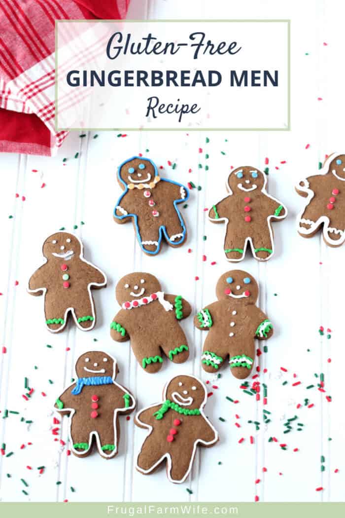 Image shoes several decorated gingerbread men on a table with text that reads "gluten-free gingerbread men recipe"
