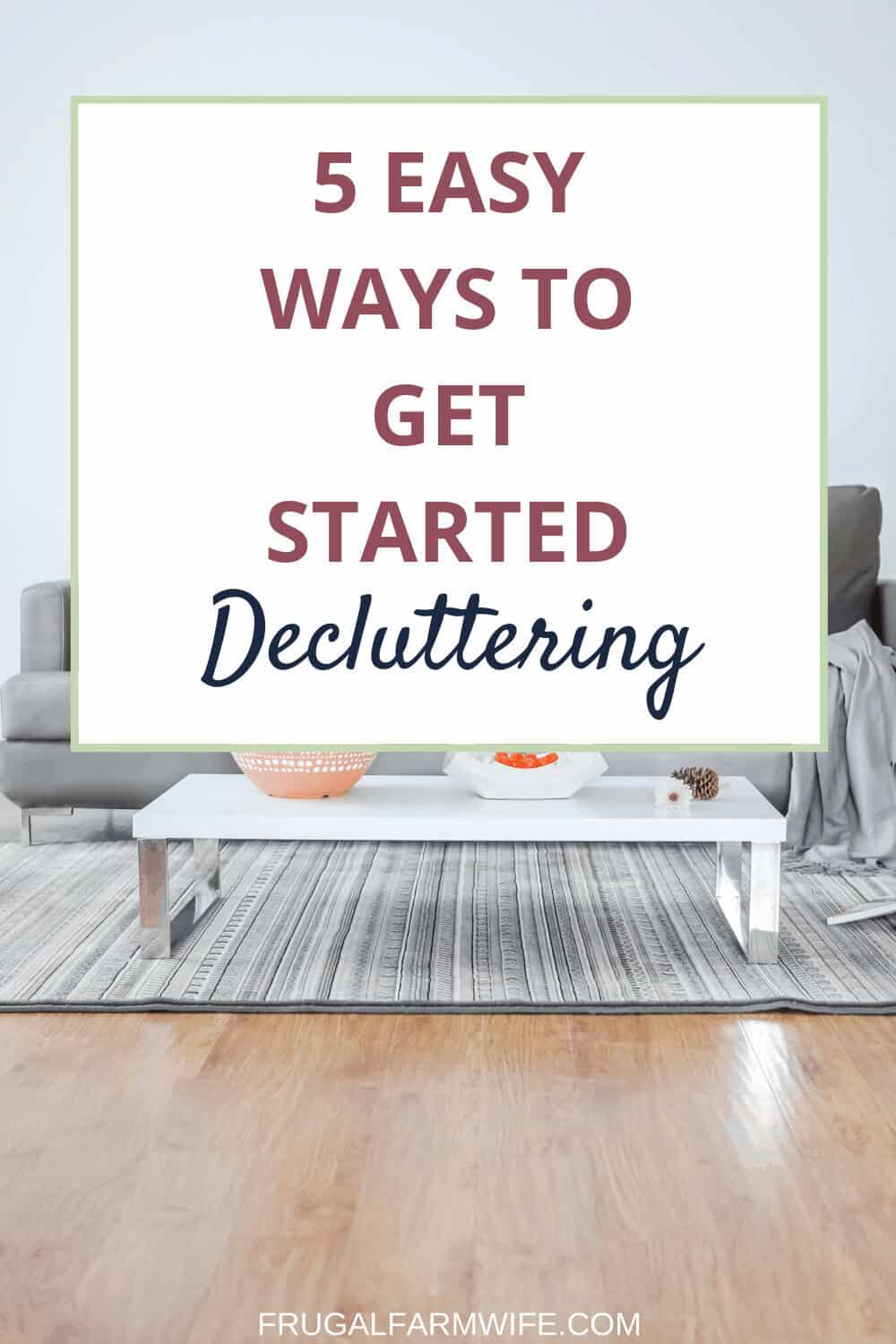 Image shows a neutral toned living room with a sleek white coffee table and grey sofa. Text box overlay reads "5 Easy Ways to Get Started Decluttering"