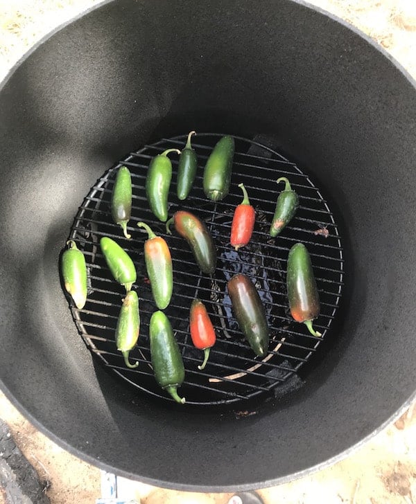 Jalapeño chipotle peppers on the smoker