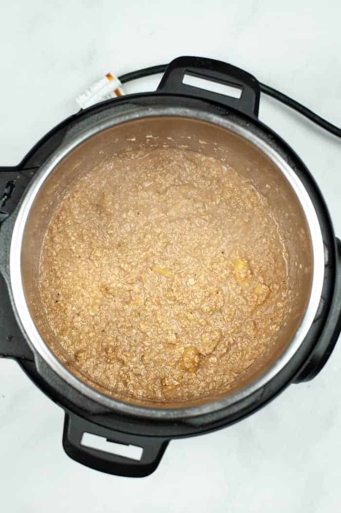 Photo shows the cooked apple cinnamon oatmeal in the Instant Pot