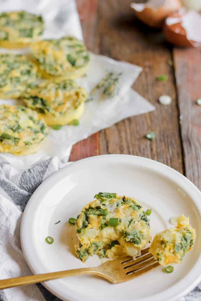 Photo shows a white plate on a table, with a small egg bite