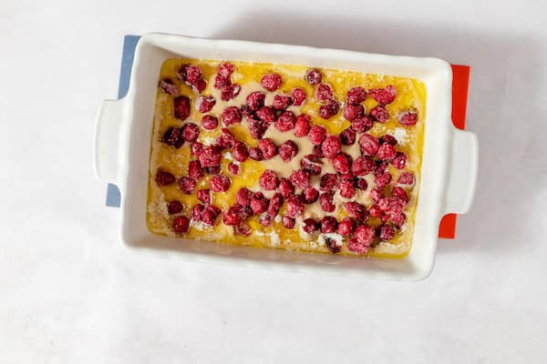 Image, taken from above, shows the sour cherry cake batter and cherries ready to go in the oven. 