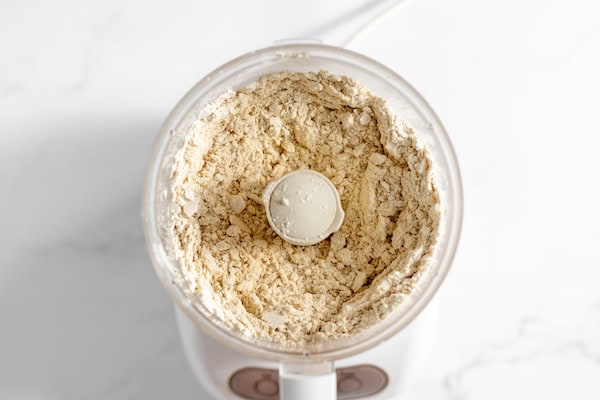 Image, taken from above shows the dry ingredients with the butter cut in for blackberry scones