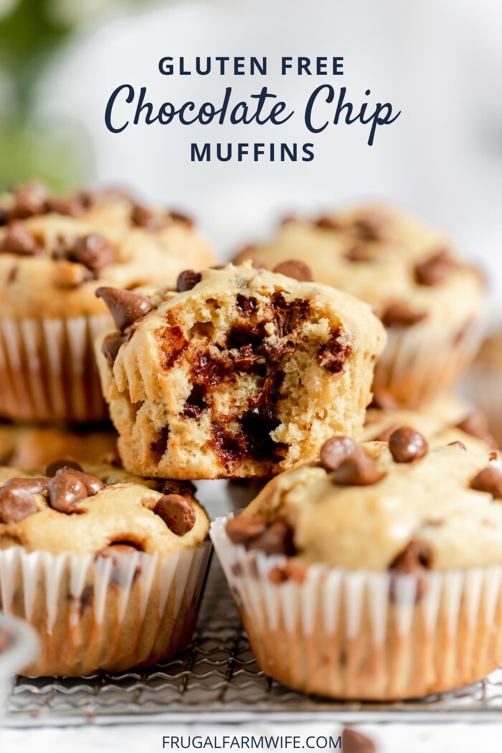 Image shows several gluten free chocolate chip muffins stacked on top of one another. The front, top muffin has a bite taken out of it. Text above the stack of muffins reads "Gluten Free Chocolate Chip Muffins"