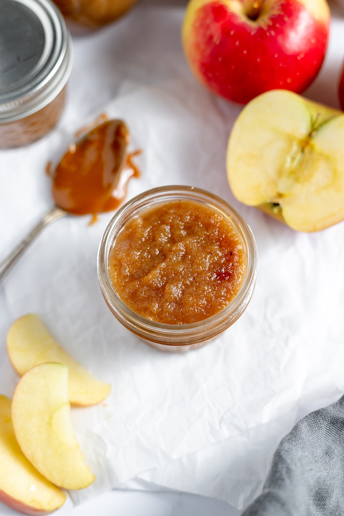 apple butter with caramel in a jar