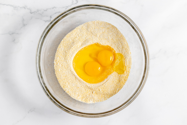 Image, taken from above, shows the eggs ready to whisk into batter