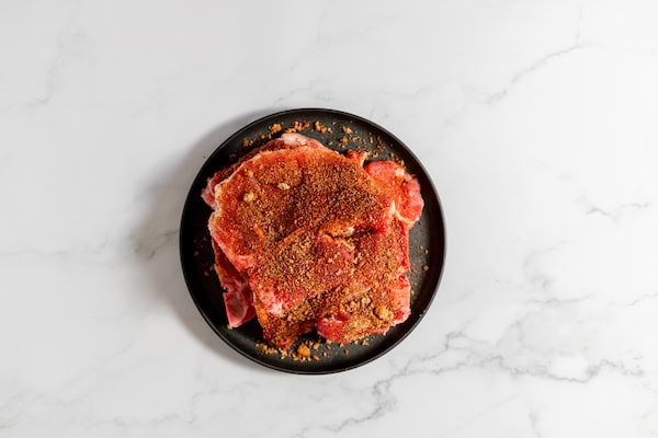 seasoned pork chops on a plate