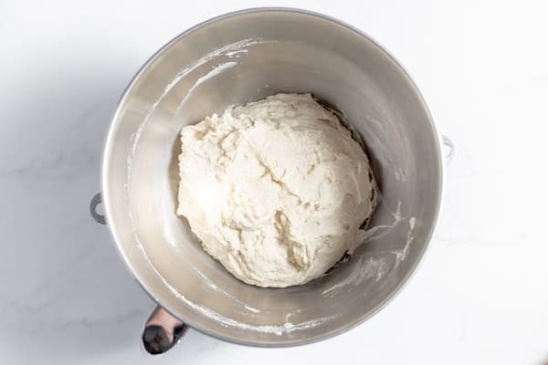 Image, taken from above, shows focaccia dough ready to rise