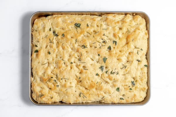 Image, taken from above, shows baked focaccia ready to serve