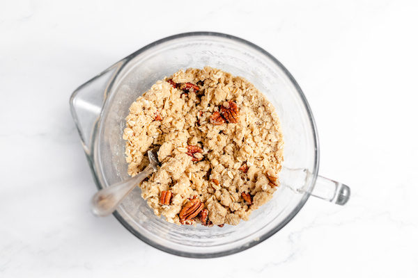 Image, taken from above, shows the peach crisp topping mixed and ready to be sprinkled.