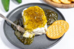 hot pepper jelly on a cheese board