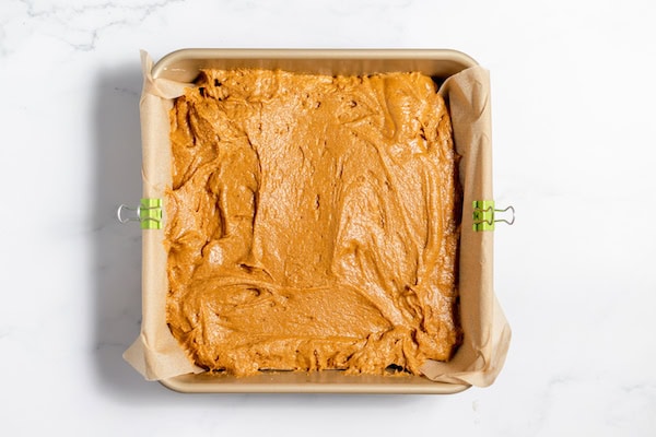 gingerbread batter in a baking pan