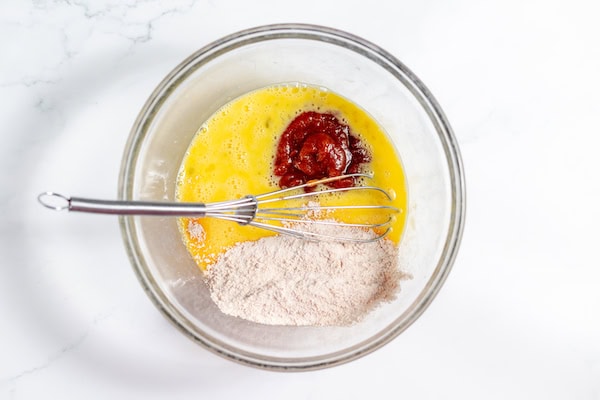 eggs, sugar, cinnamon and apple butter in a bowl