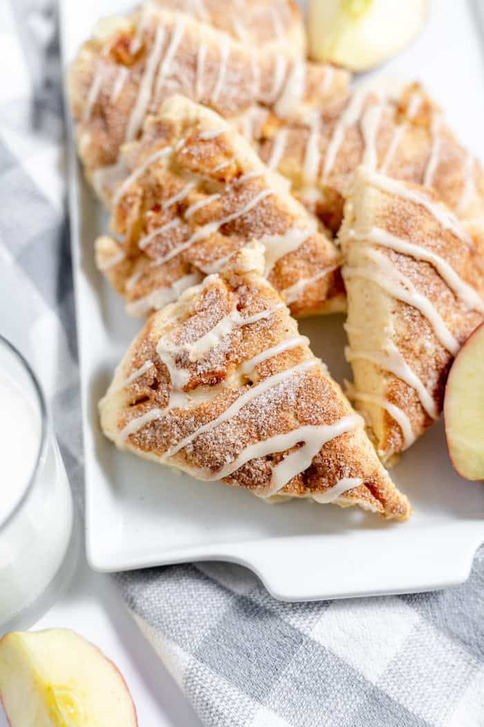 plate of apple scones with a glass of milk