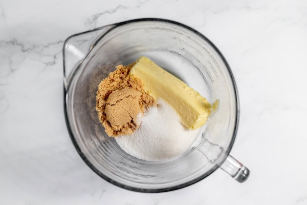 butter, brown sugar, and white sugar in a bowl