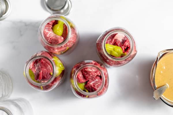 deer pot roast in canning jars with seasonings