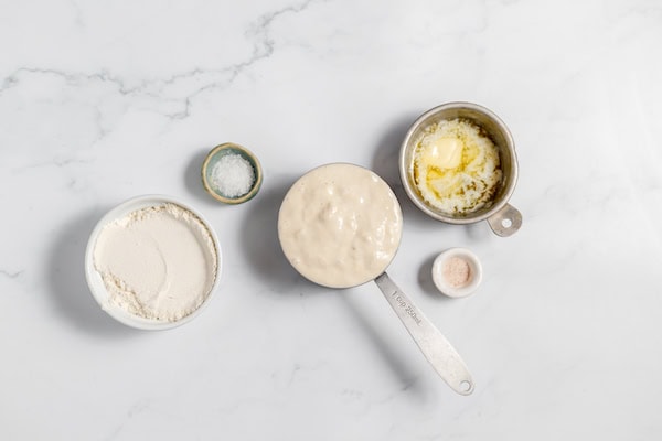 Image, taken from above, shows the ingredients for making sourdough crackers