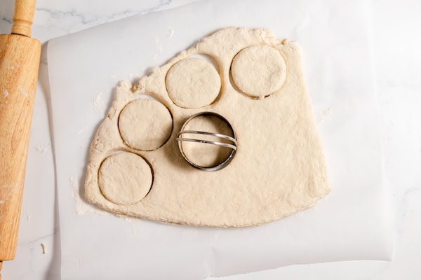 cutting biscuits on a lightly floured surface