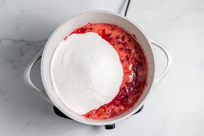 sugar and boiling cherry mash