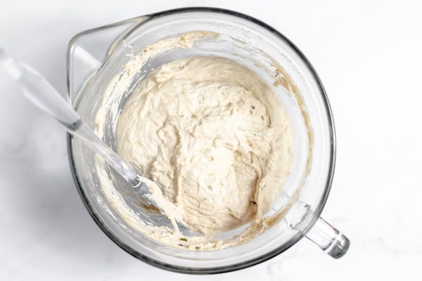 bread dough rising in bowl