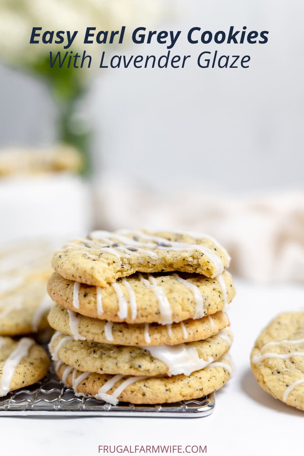 Image shows a small stack of Earl Grey cookies on a cooling rack, drizzled with lavender glaze. Text above reads "Easy Earl Grey Cookies with Lavender Glaze"