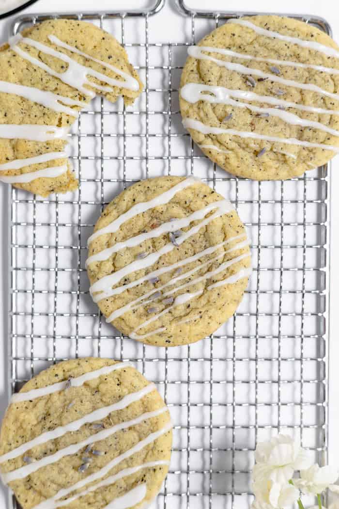 Image, taken from above, shows a cooling rack with glazed cookies ready to serve