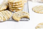 earl grey cookies with lavender glaze on a wire rack.
