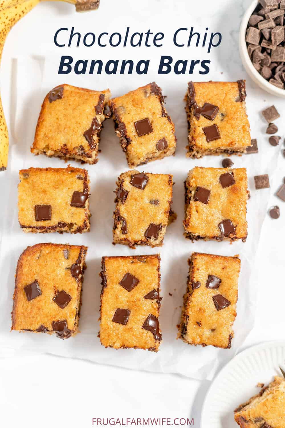 Image, taken from above, shows chocolate chip banana bars sliced and placed on a parchment paper. Chocolate chunks are sprinkled nearby. Text above reads "Chocolate Chip Banana Bars."