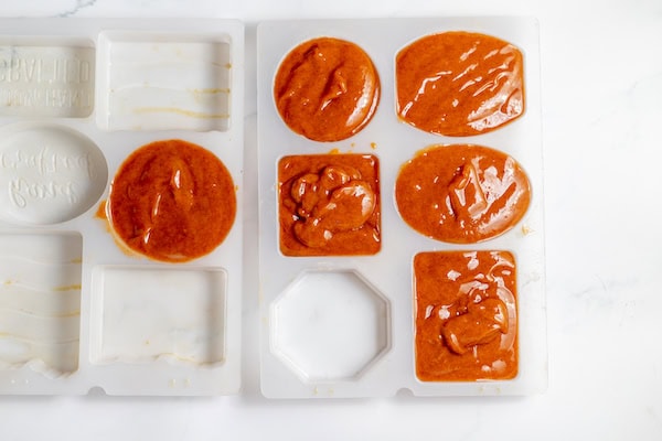 fresh soap poured into molds to cure